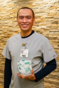 Lito Casilang, Nurse Aide, receives TULIP Award