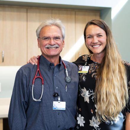 Practitioner works alongside physician who delivered her