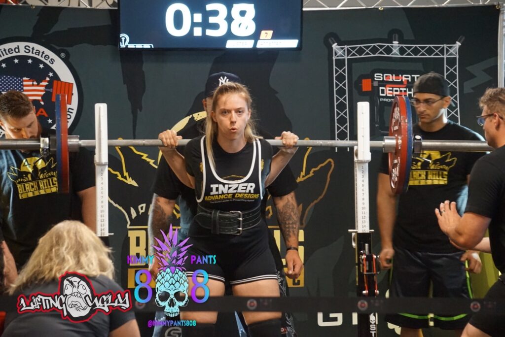 Rachel Astleford, Clinical Dietitian, prepares to squat at the 2022 Black Hills Classic powerlifting competition.