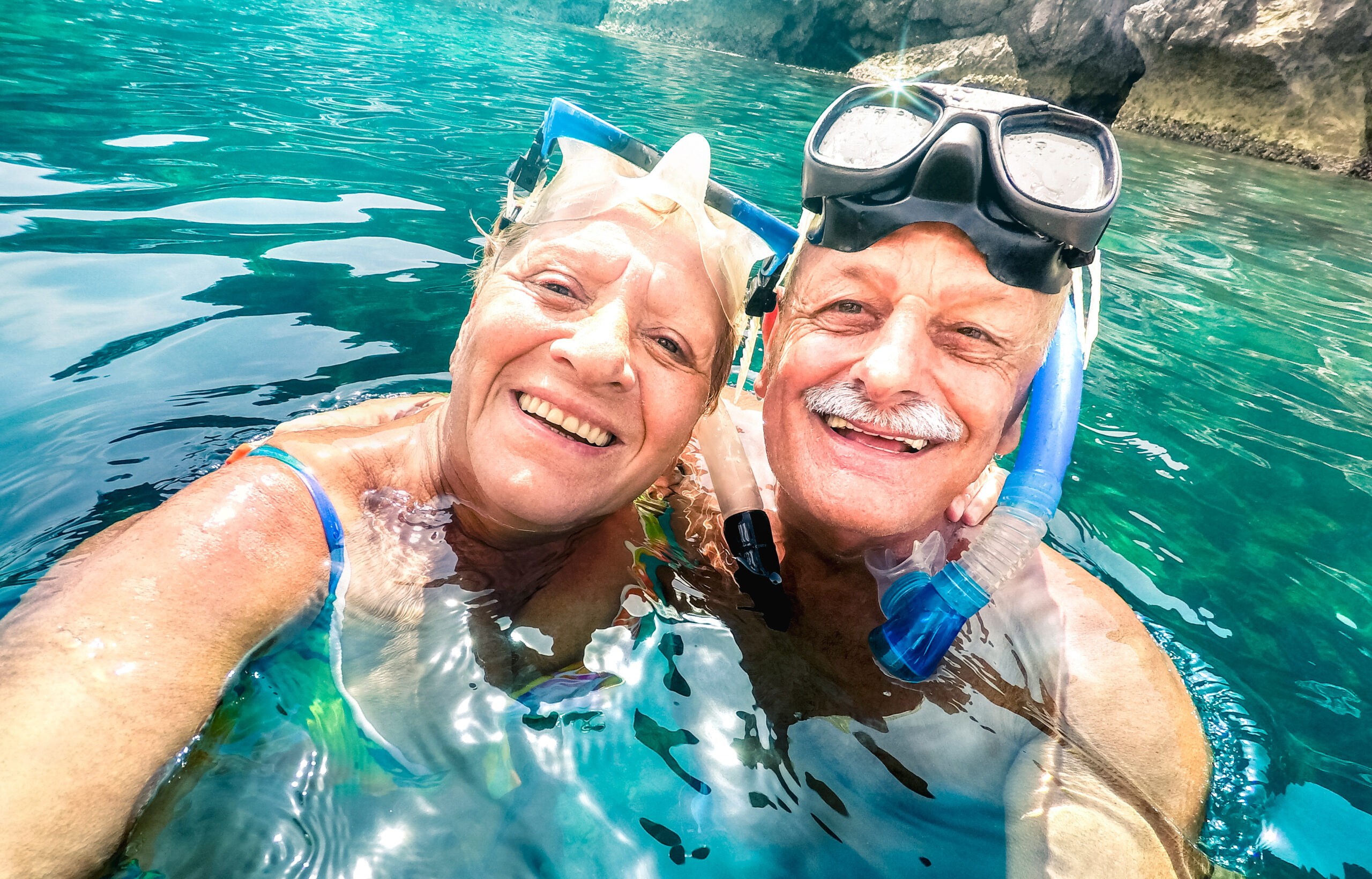 Happy,Retired,Couple,With,Scuba,Mask,Taking,Selfie,At,Tropical