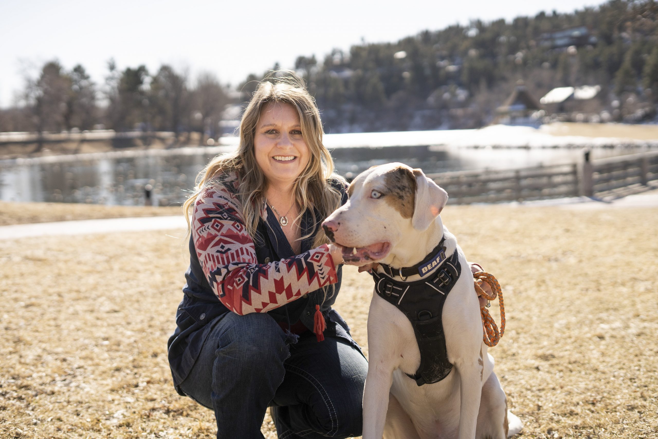 Caregiver and dog “Blue” offer compassion to deaf community